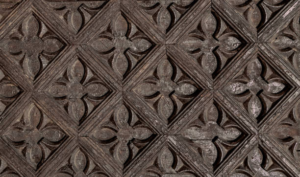 istock Vintage carved brown wood background 1389967220
