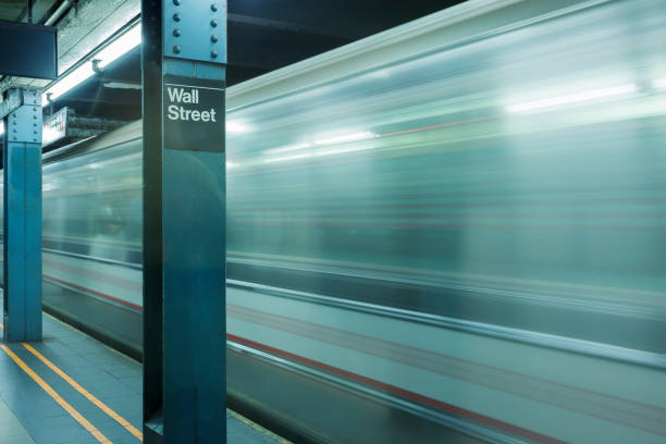 subway train in motion at wall street station, new york - wall street imagens e fotografias de stock