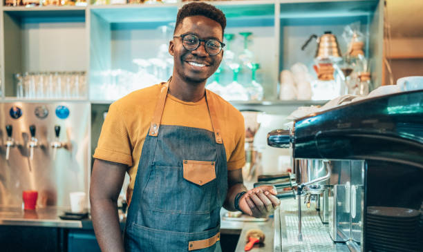 istock Portrait of happy bartender 1389971961