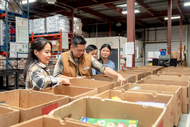 Packing at a Local Food Bank stock photo