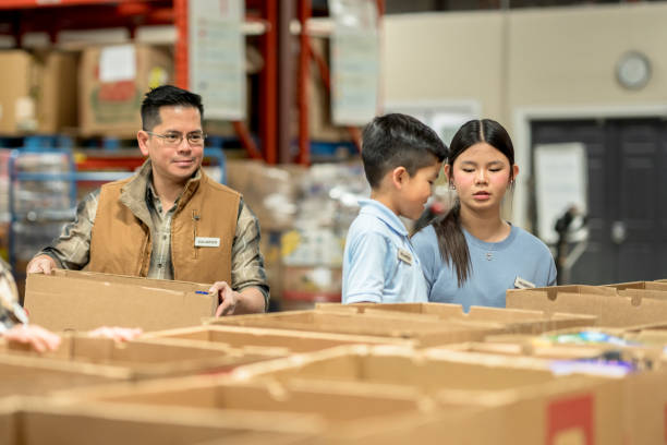 istock Packing at a Local Food Bank 1389973547