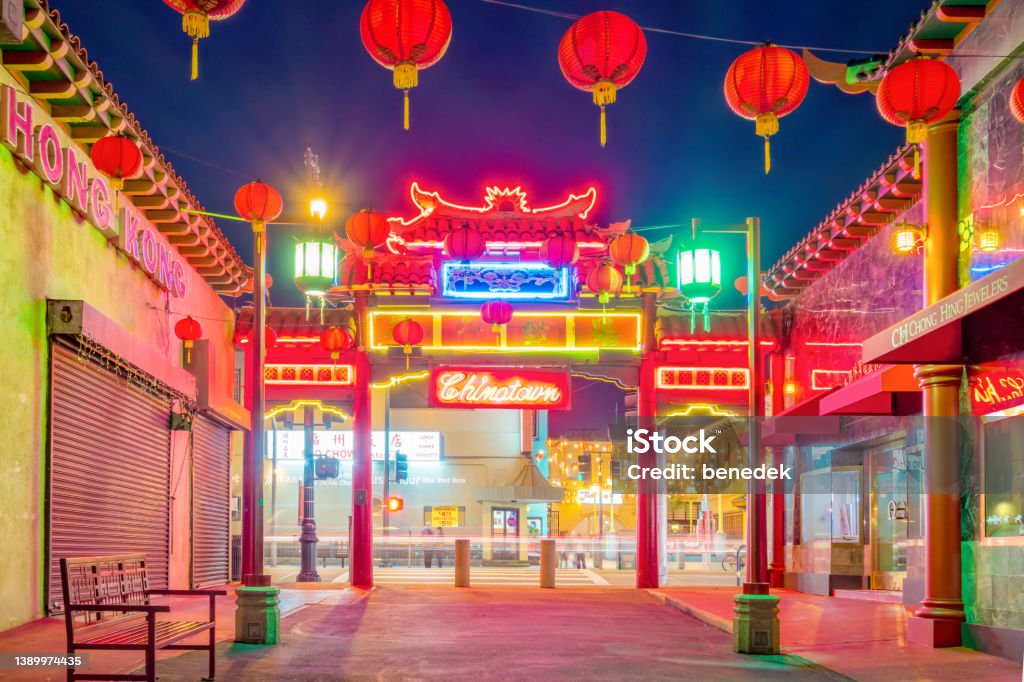 Los Angeles Chinatown Gate Illuminated, traditional gate in Chinatown, downtown Los Angeles, California, USA at night. Los Angeles County Stock Photo