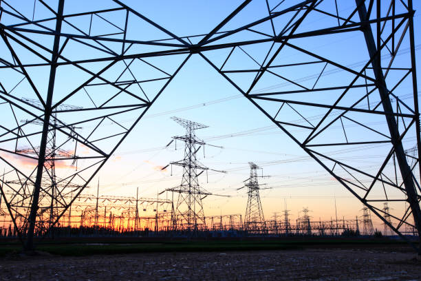 istock Pylons, high voltage pylons in the evening 1389976792