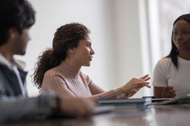 istock Female University Student Studying with Peers 1389976873
