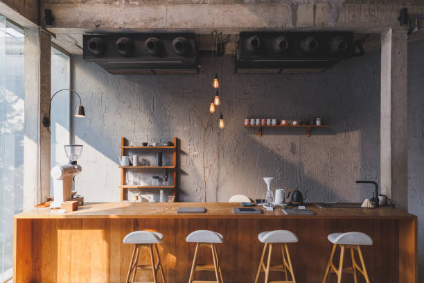 istock cafe interior Layout in a loft style in dark colors open space interior view of various coffee Welcome open coffee shop background 1389983808