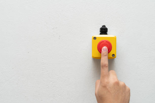 istock Stop Red Button and the Hand of Worker 1389986964