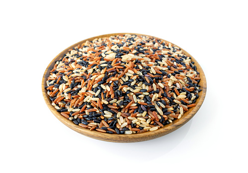 Mixed rice in wooden dish isolated