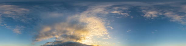 istock Dark blue sunset sky panorama with Cumulus clouds. Seamless hdr pano in spherical equirectangular format. Complete zenith for 3D visualization, game and sky replacement for aerial drone 360 panoramas 1390005781