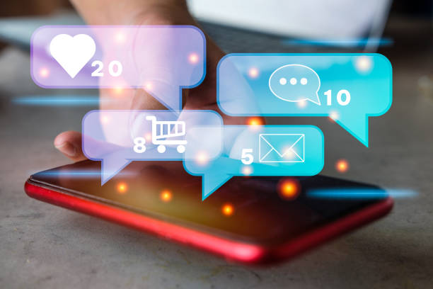 istock A man use mobile phone with multimedia technology icons on virtual screen. 1390006947