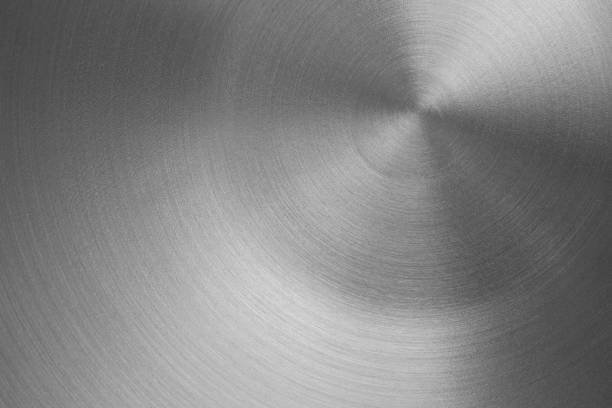 istock silver metal background with realistic round brush texture 1390012220