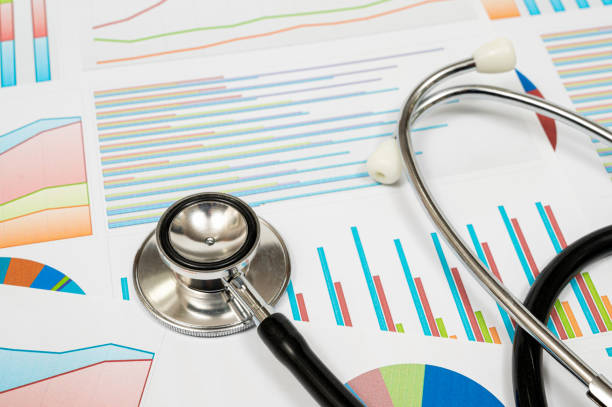 istock Medical concept background with several types of graphs and a stethoscope. 1390013155