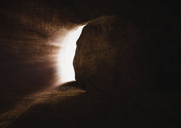 The death and resurrection of Jesus Christ, the tomb and the bright light The death and resurrection of Jesus Christ and the opening of the tomb door and a bright light coming out lent stock pictures, royalty-free photos & images