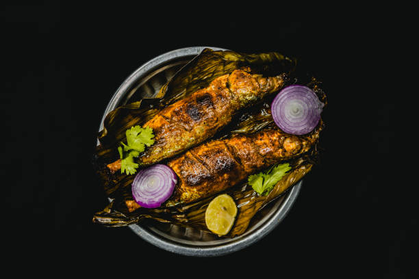 istock Kerala Traditional Fish Fry ( Meen Polichathu ) 1390028561