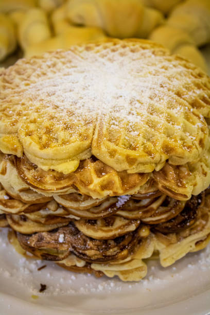 istock Baked waffles with powdered sugar 1390029292
