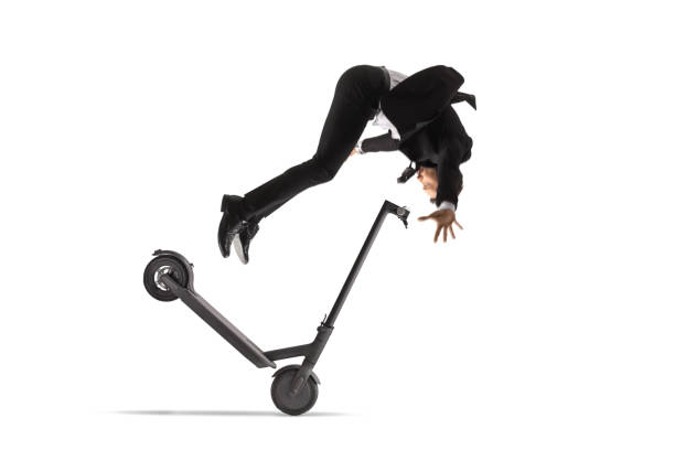 accident with an electric scooter and a businessman falling - freefall imagens e fotografias de stock