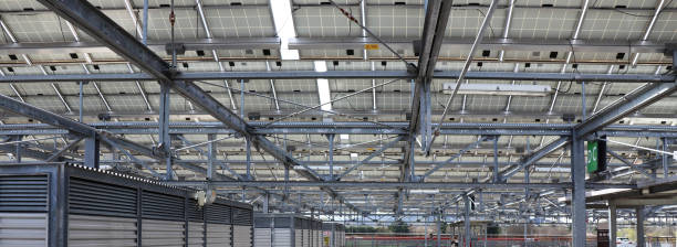istock Solar Panels for renewable electrical energy production. View from below 1390032864
