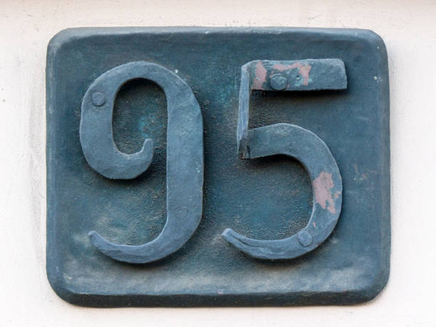 istock Metal home number on a wall 1390033423