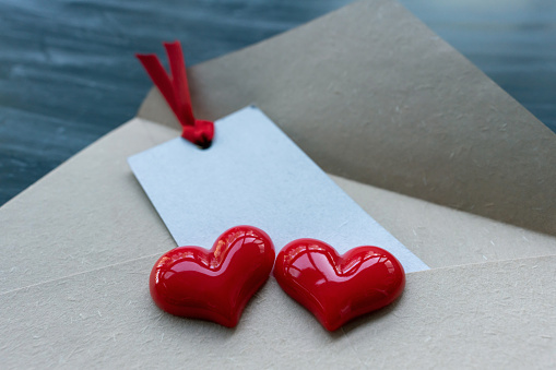 Red heart on the envelope background