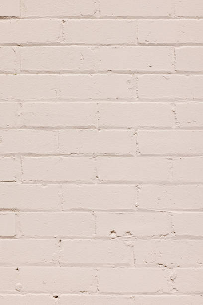 istock Part of a cream colored brick wall 1390033634