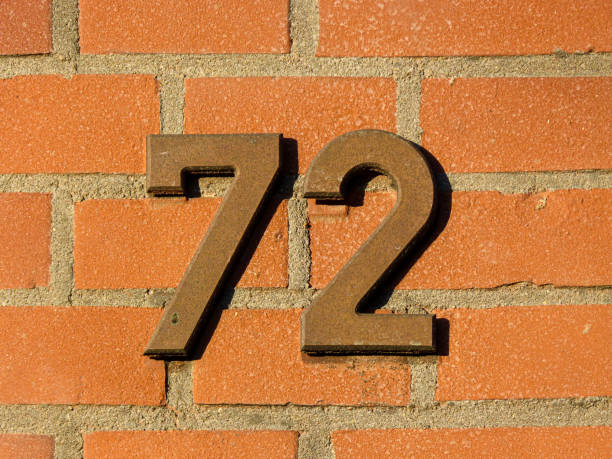 istock Metal home number on a wall 1390033675