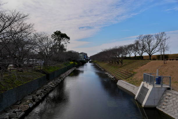 istock Fountain like canal surrounded by bank 1390033770