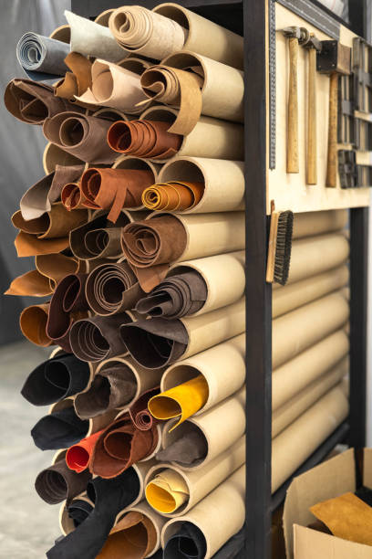 istock Material for creating handmade production at leather workshop. Storage organization at tannery 1390034976
