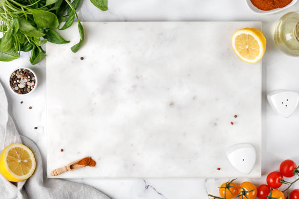 White food background with empty white stone board. Free space for text or product. Top view.