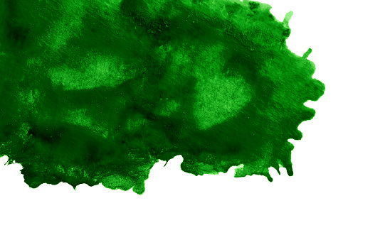 Green paint spot isolated on a white background. Space for copy.