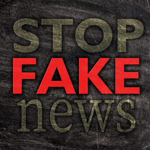 istock Stop Fake News on a gray background 1390038775