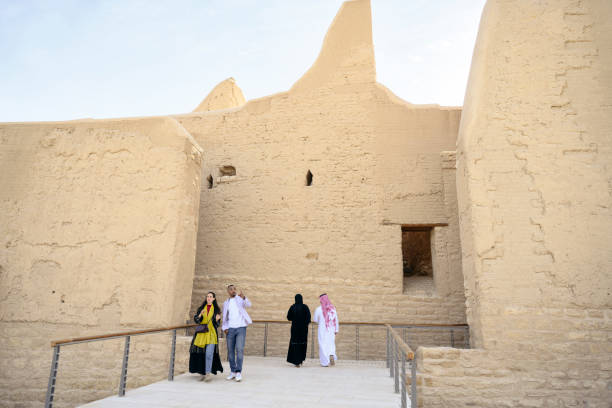 istock Local couple and vacationers visiting Diriyah ruins 1390040483