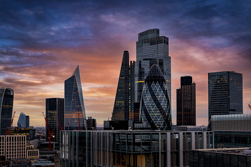 The different shaped skyscrapers of the financial district City of London during dusk, England