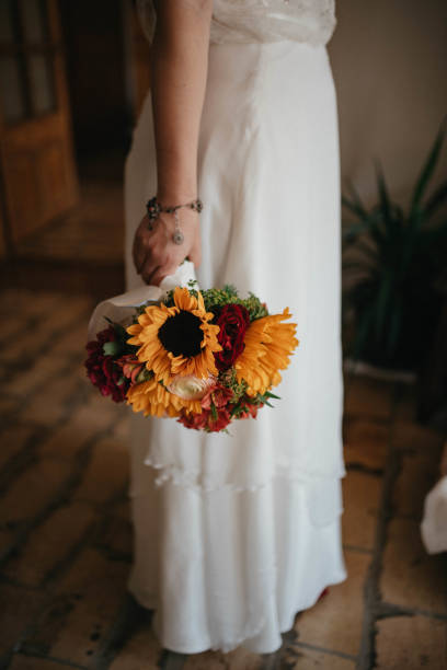 istock Bride holds beautiful wedding bouquet. Rustic wedding bouqet. 1390041782