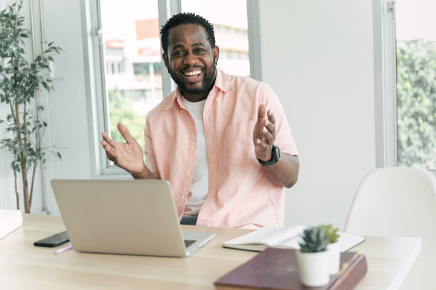 istock Happy businessman working with laptop computer in home office 1390041809