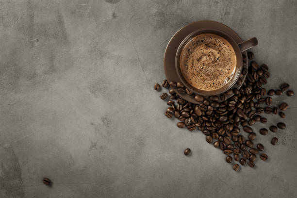 istock A cup of coffee and coffee beans on the table. 