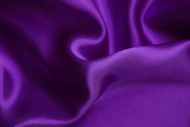 istock Purple fabric cloth texture for background and design art work, beautiful crumpled pattern of silk or linen. 1390045500
