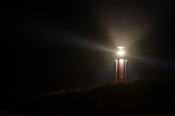 istock Texel lighthouse in the dunes during a stormy autumn night 1390046164