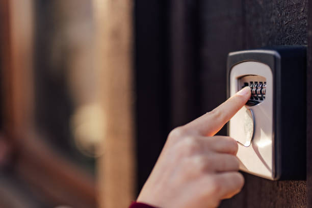 istock A person using a finger, pressing the right numbers to unlock. 1390048583