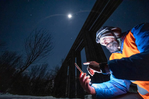 istock Road engineer working at night. Building new highways. 1390053571
