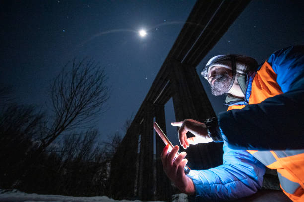 istock Road engineer working at night. Building new highways. 1390053573