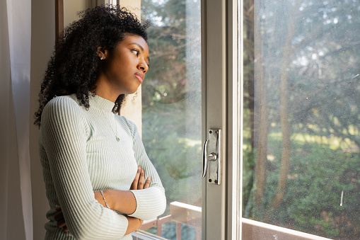 One black woman suffering depression at home
