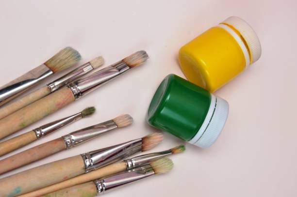 istock watercolor paints and brushes 1390060549