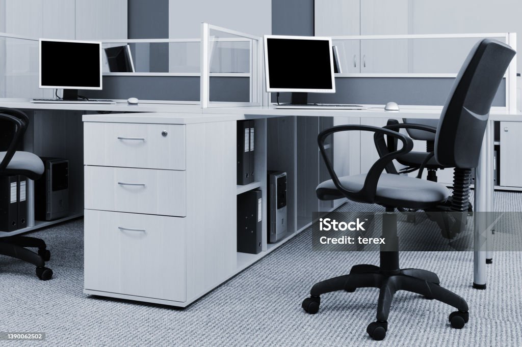 workplaces with computers in modern office workplaces with computers in a modern office Office Stock Photo