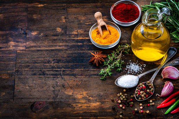 istock Salt, pepper, olive oil and spices. Copy space 1390064477