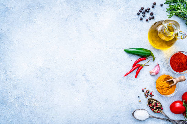 istock Vegetables, herbs and spices background. Copy space 1390064485