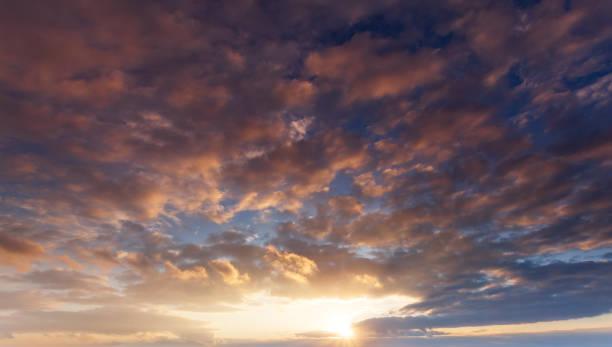 istock Clouds in the sky at dusk. The sky before sunset 1390065915