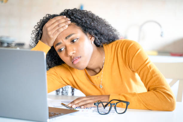istock One black woman worried about home expenses billing charges 1390066016