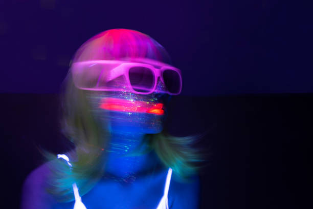 Light painting portrait Light painting portrait of a young woman with eyeglasses. New art direction, long exposure photo without processing, light drawing at long exposure electromagnetic photos stock pictures, royalty-free photos & images