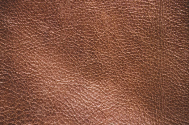 istock Genuine leather texture background. Dark brown, orange textures for decoration blank. Vintage skin natural suede with design line pattern or red abstract can use wallpaper or backdrop luxury event. 1390069598