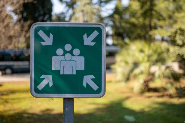 istock A sign for a meeting point in a green park. 1390070050