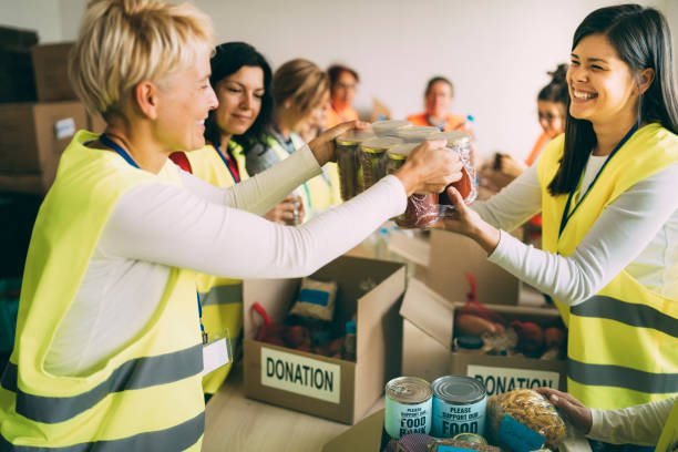 Charity workers during their work in donation stock photo